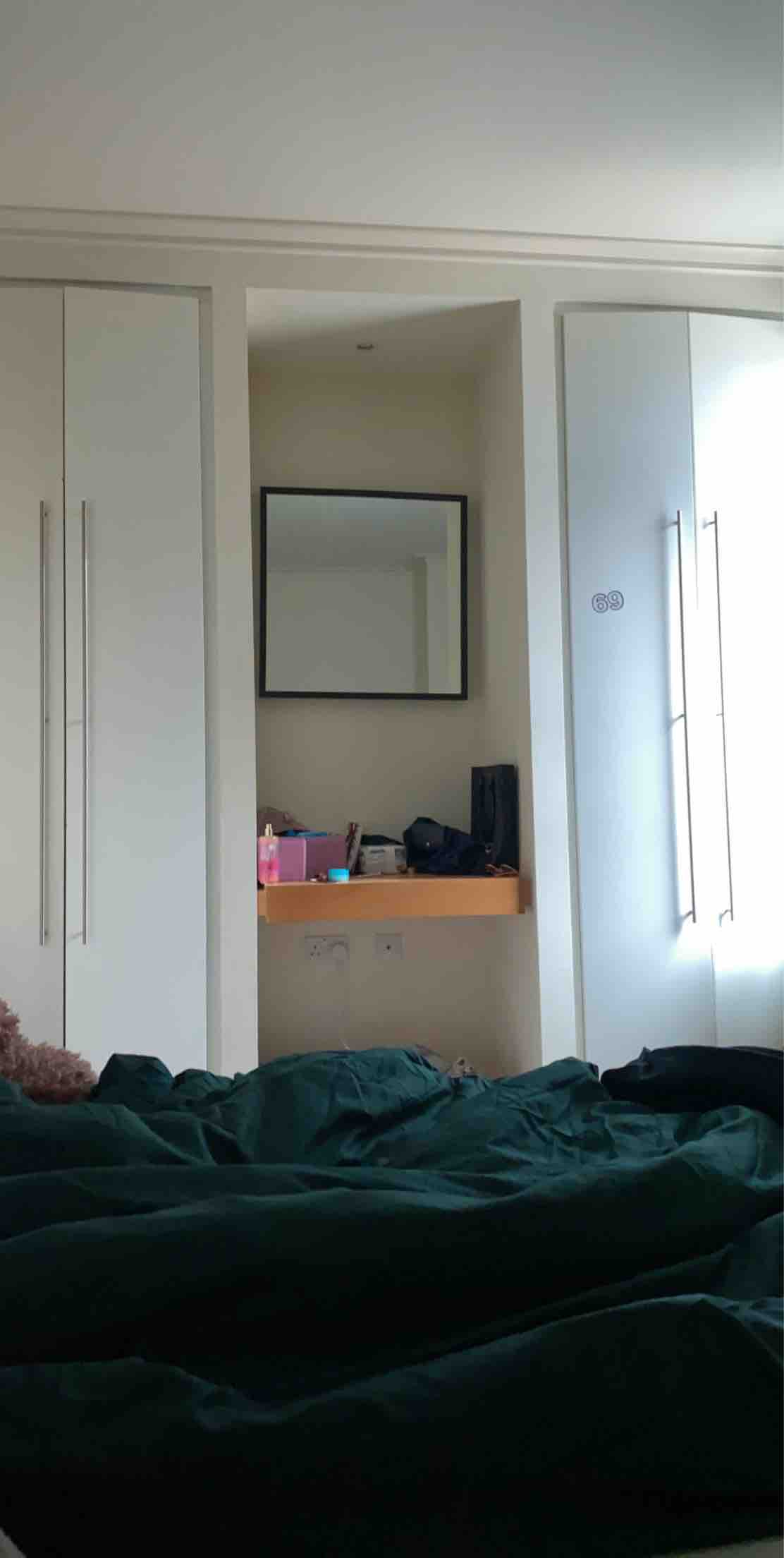 Spacious bedroom in Canary Wharf RoomsLocal image